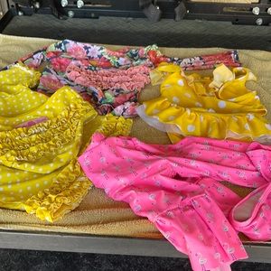 4 swimsuits! 2 Ruffle Butts swim suits and 2 other suits